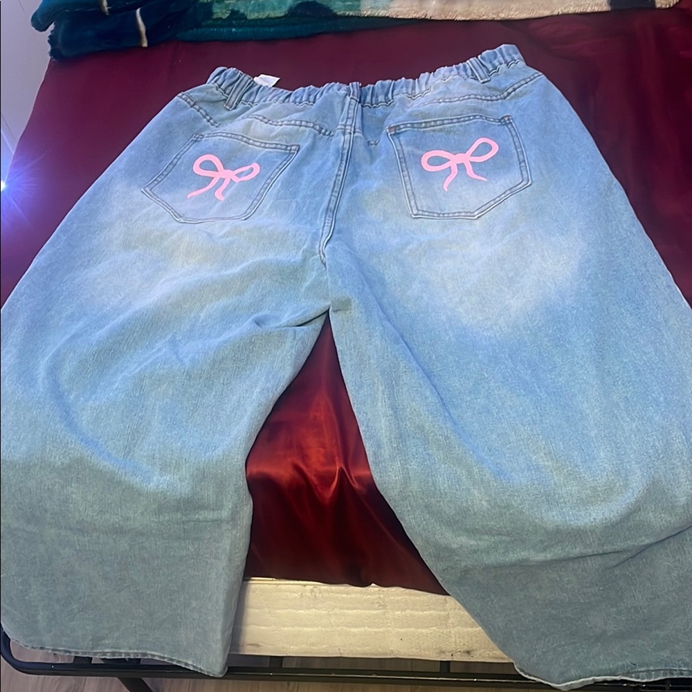 Women's Blue Jeans with Pink Bow Detail